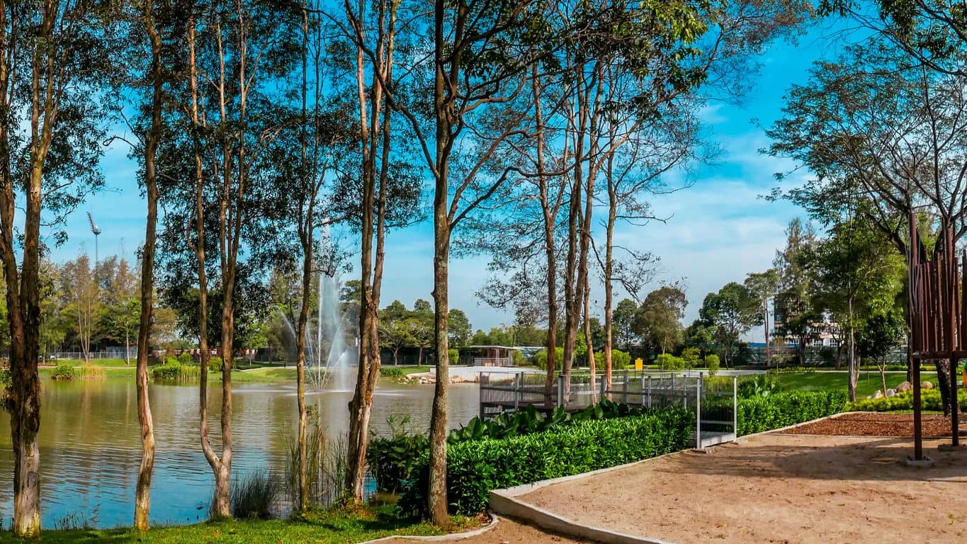 Lakeside walking path and trees at Lake Park, Setia Bayuemas